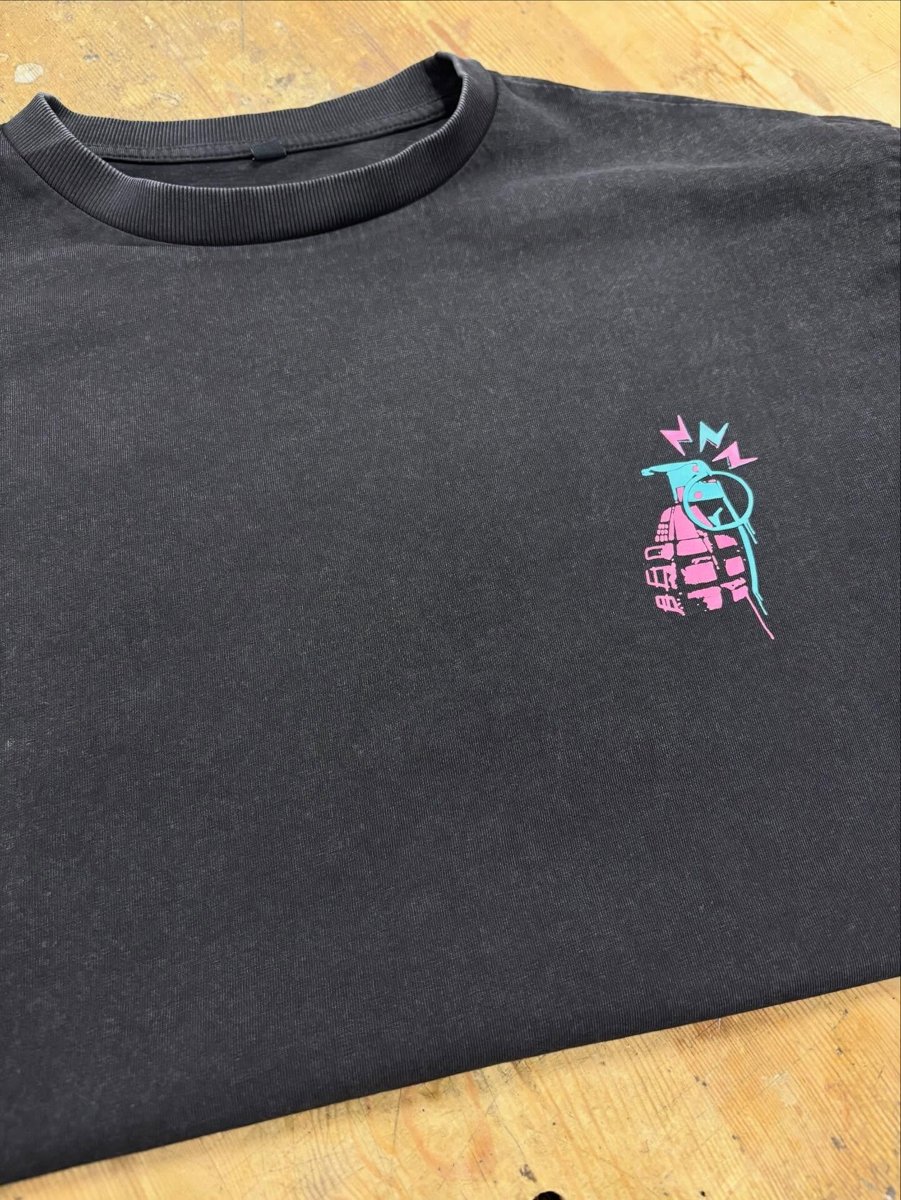 Printed detail on a stonewashed Ask My Bull T-shirt