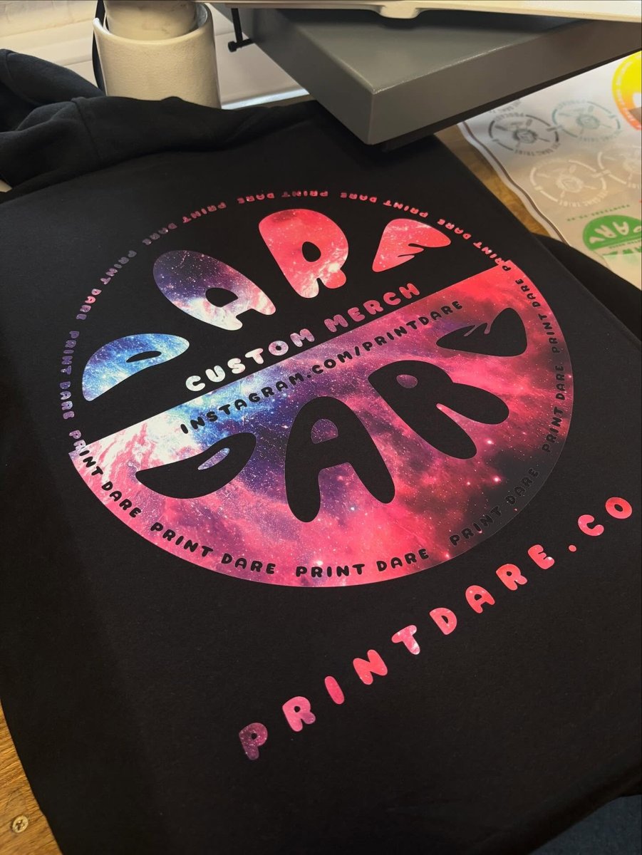 Full-colour galaxy design printed on a black PrintDare hoodie